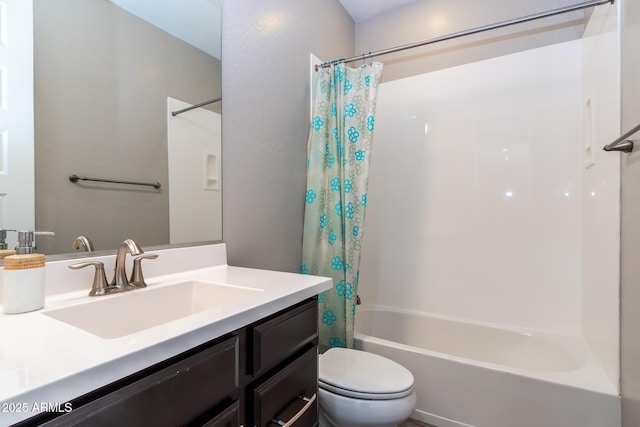 full bathroom featuring shower / tub combo with curtain, vanity, and toilet