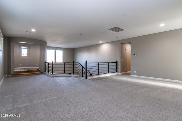 empty room with light colored carpet