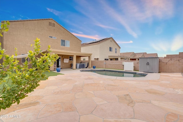 view of pool featuring central air condition unit, a patio area, a fenced in pool, and a fenced backyard