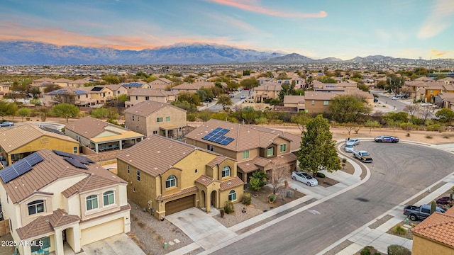 bird's eye view featuring a mountain view and a residential view