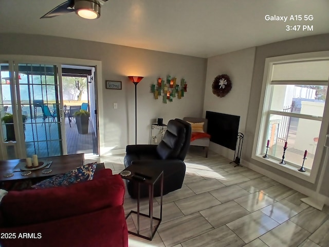 living room with ceiling fan