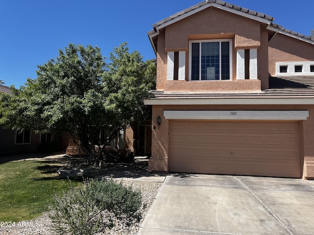 view of front of home with a garage