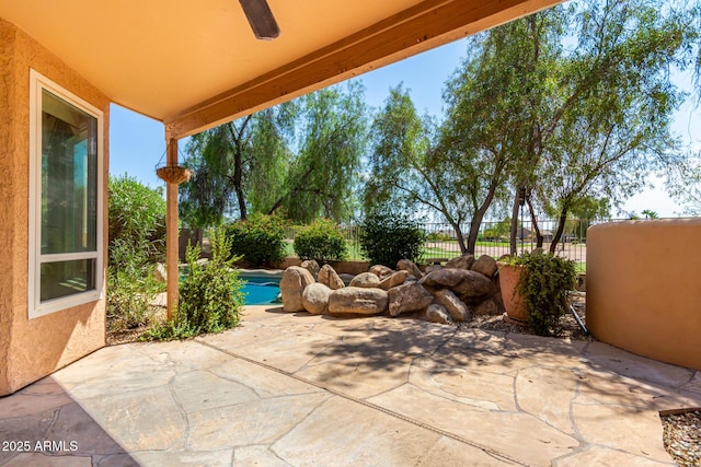 view of patio / terrace featuring ceiling fan