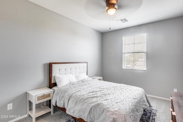 bedroom with ceiling fan and carpet flooring