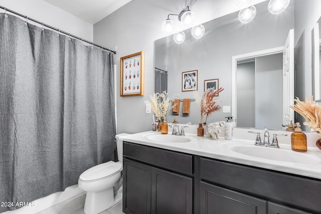 bathroom with vanity, toilet, and a shower with shower curtain