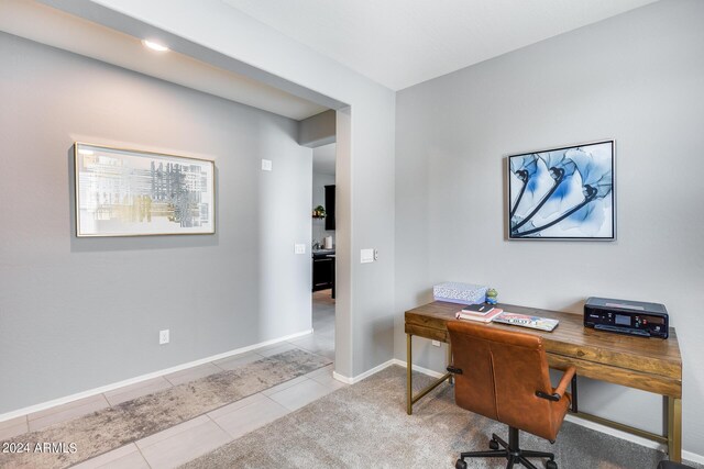 office area featuring light tile patterned flooring