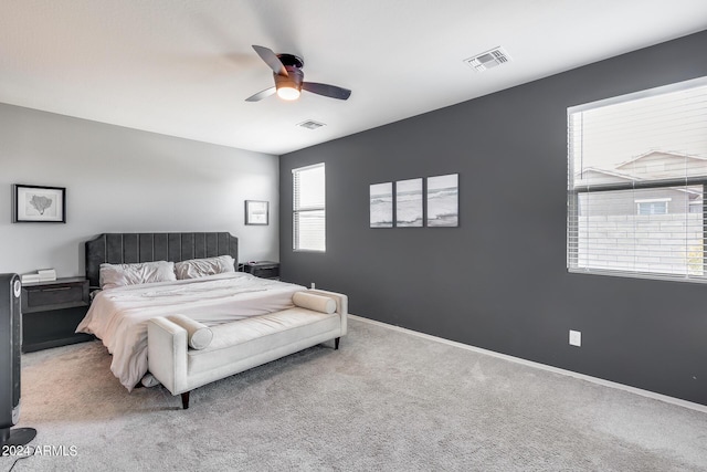 bedroom featuring ceiling fan and carpet flooring