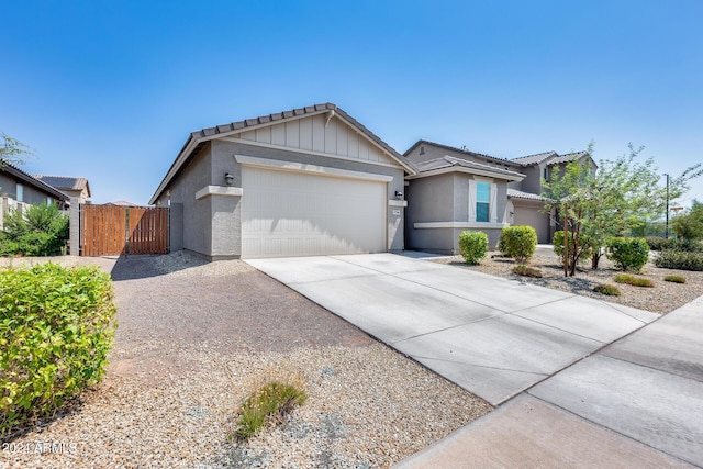 ranch-style house featuring a garage