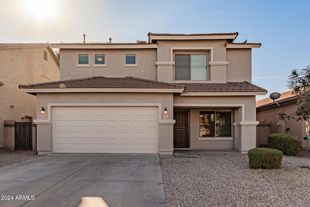 view of front of property with a garage