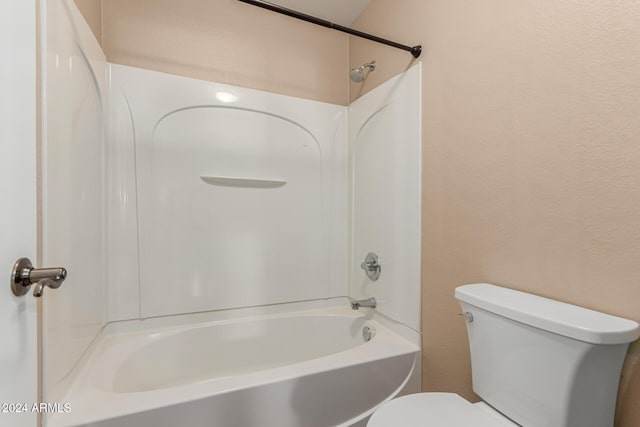 bathroom with shower / bathtub combination and toilet