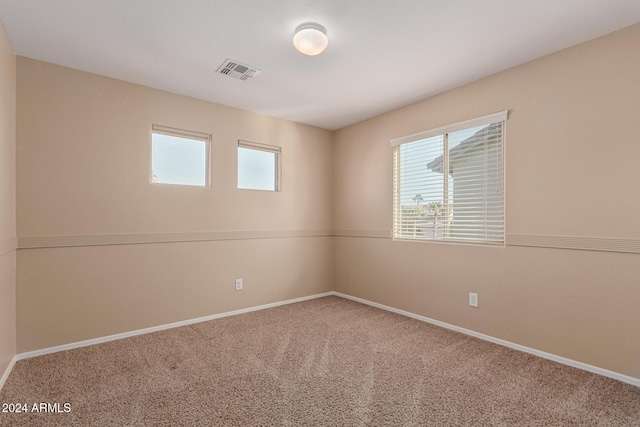 view of carpeted spare room