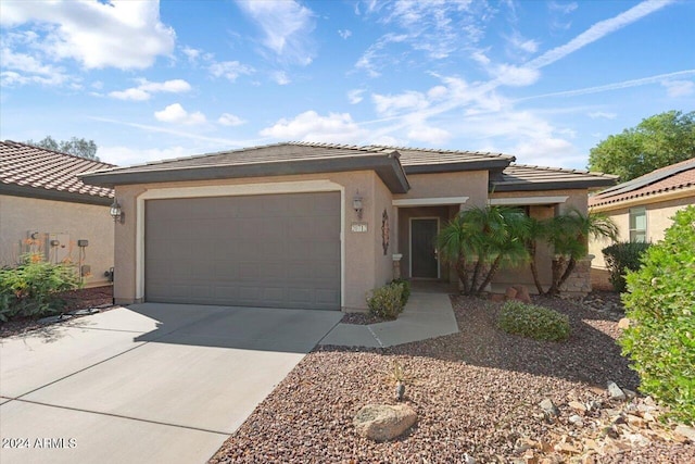 view of front of home with a garage