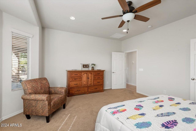 carpeted bedroom with ceiling fan