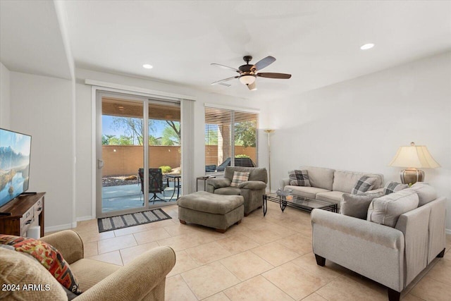 living room with light tile patterned flooring and ceiling fan