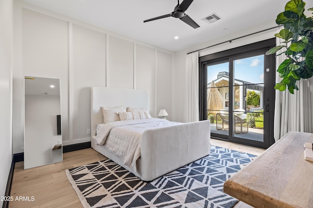 bedroom featuring ceiling fan, access to outside, and light wood-type flooring