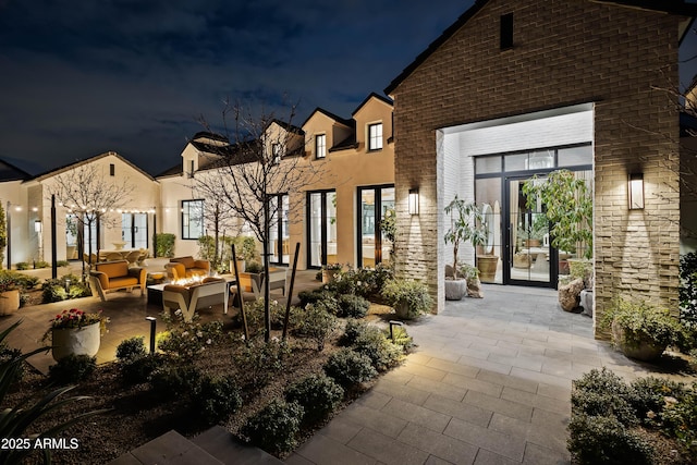 exterior space featuring an outdoor hangout area