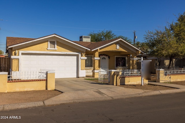 single story home featuring a garage