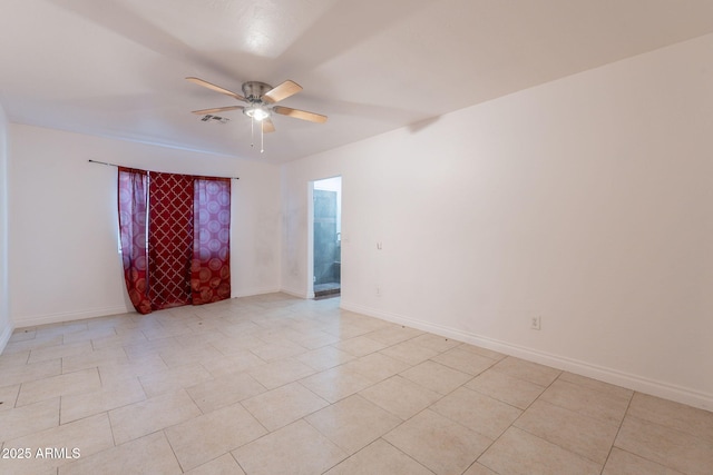 3140 W Alvarado Rd, Phoenix, AZ 85009 - unfurnished room featuring ceiling fan and light tile patterned floors