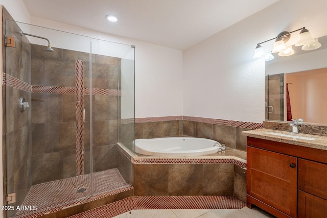 3140 W Alvarado Rd, Phoenix, AZ 85009 - bathroom featuring vanity, a bath, a stall shower, recessed lighting, and tile patterned floors