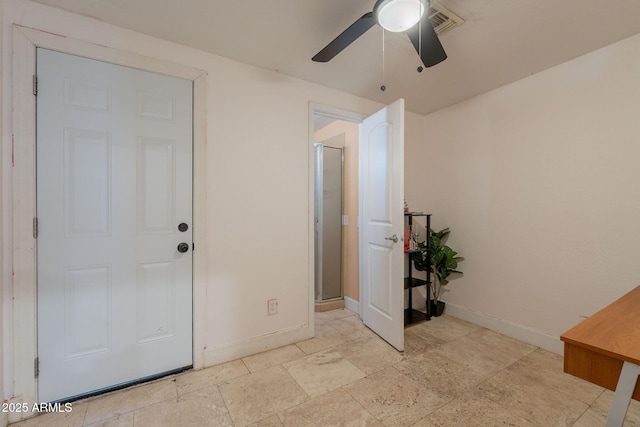 3140 W Alvarado Rd, Phoenix, AZ 85009 - entrance foyer featuring ceiling fan and baseboards