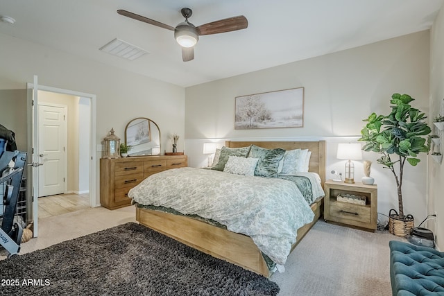 5759 W Saratoga Ct, Florence, AZ 85132 - bedroom with light carpet and ceiling fan