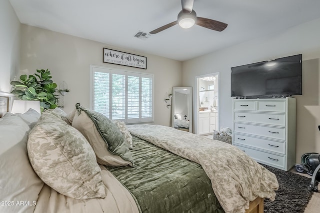 5759 W Saratoga Ct, Florence, AZ 85132 - bedroom featuring ensuite bathroom and a ceiling fan