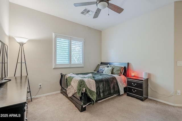 5759 W Saratoga Ct, Florence, AZ 85132 - bedroom featuring light carpet, baseboards, and ceiling fan