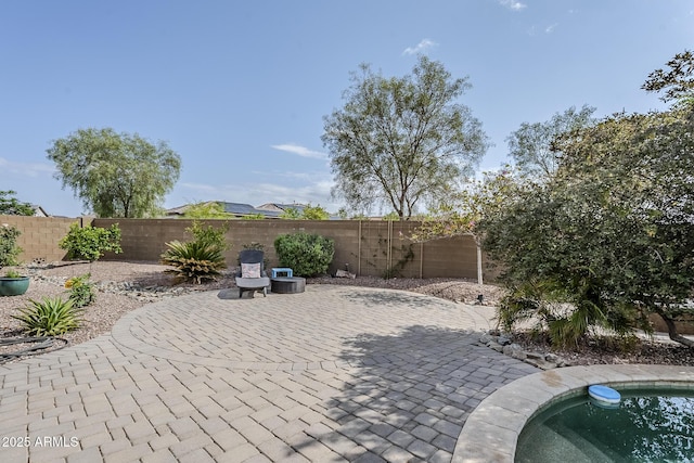 5759 W Saratoga Ct, Florence, AZ 85132 - view of patio featuring a fenced backyard
