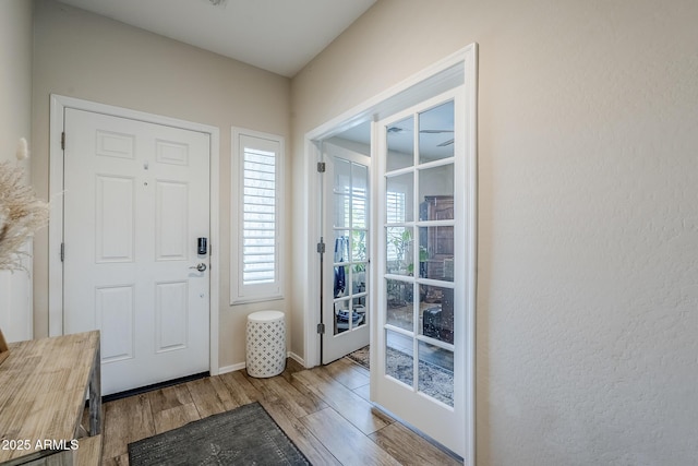 5759 W Saratoga Ct, Florence, AZ 85132 - entryway with wood finished floors and baseboards