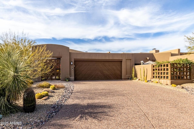 adobe home with a garage