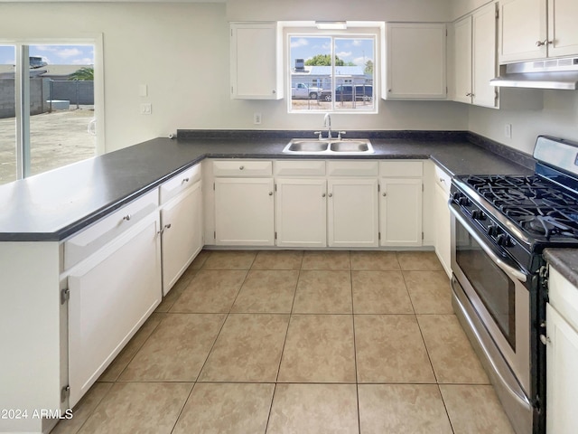 kitchen featuring plenty of natural light, white cabinetry, sink, and stainless steel range with gas stovetop