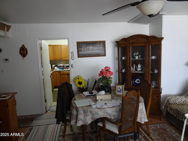 dining space with ceiling fan