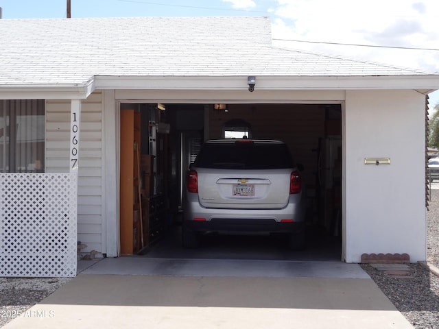 garage featuring driveway