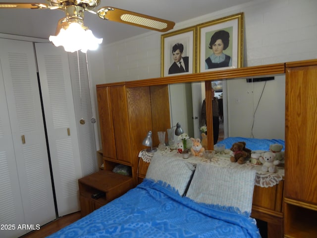 bedroom with ornamental molding and a closet