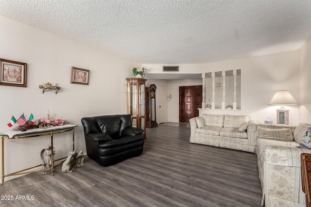 3901 W Augusta Ave, Phoenix, AZ 85051 - living room with dark wood-style flooring and a textured ceiling