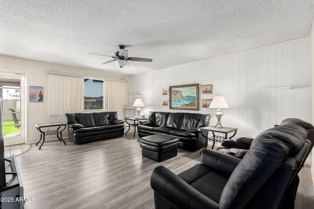 3901 W Augusta Ave, Phoenix, AZ 85051 - living area featuring wood finished floors, ceiling fan, and a textured ceiling