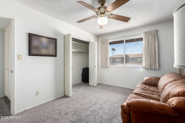 3901 W Augusta Ave, Phoenix, AZ 85051 - sitting room featuring ceiling fan, carpet flooring, a textured ceiling, and baseboards