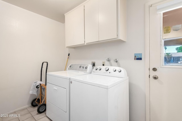 3901 W Augusta Ave, Phoenix, AZ 85051 - clothes washing area featuring cabinet space, washing machine and dryer, light tile patterned flooring, and baseboards