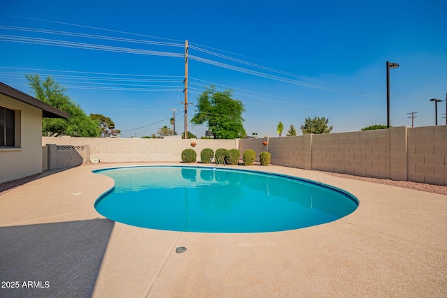 3901 W Augusta Ave, Phoenix, AZ 85051 - view of swimming pool featuring a fenced backyard and a patio