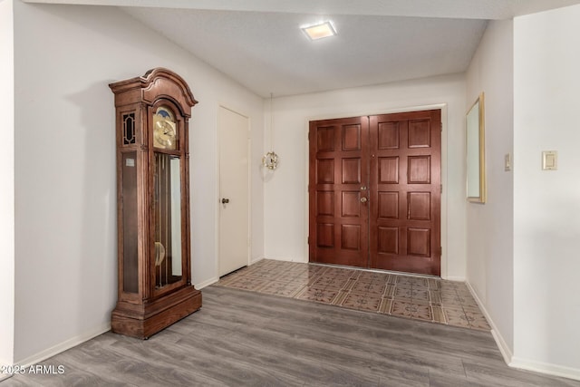 3901 W Augusta Ave, Phoenix, AZ 85051 - foyer entrance with wood finished floors and baseboards