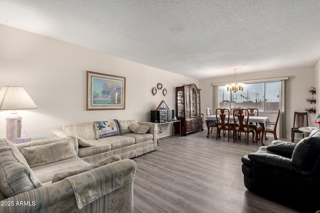 3901 W Augusta Ave, Phoenix, AZ 85051 - living room with a chandelier, a textured ceiling, and wood finished floors