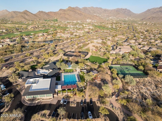 birds eye view of property featuring a mountain view