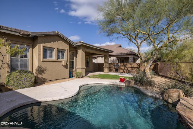 view of pool featuring a patio area, a fenced in pool, and a fenced backyard