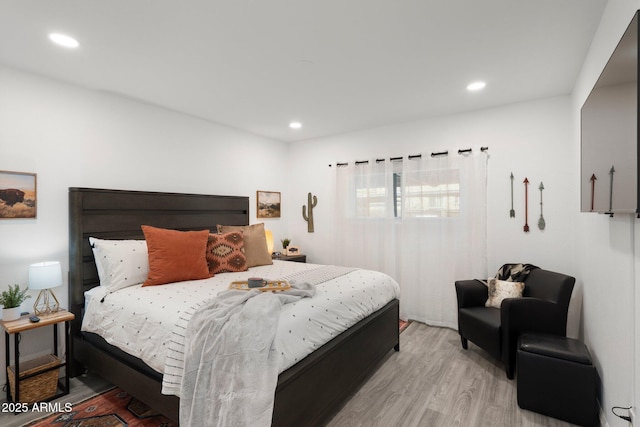 bedroom featuring light hardwood / wood-style floors