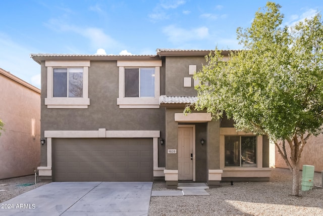 view of front of home with a garage