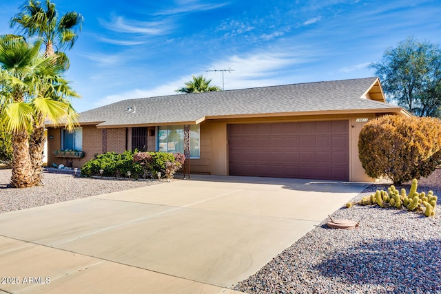 ranch-style home with a garage