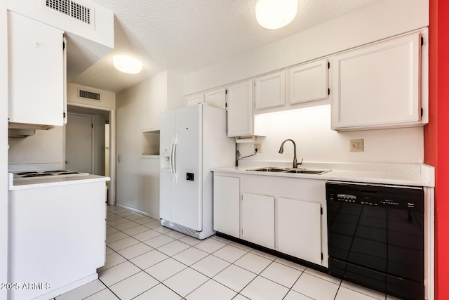 kitchen with white cabinetry, black dishwasher, sink, white refrigerator with ice dispenser, and a textured ceiling