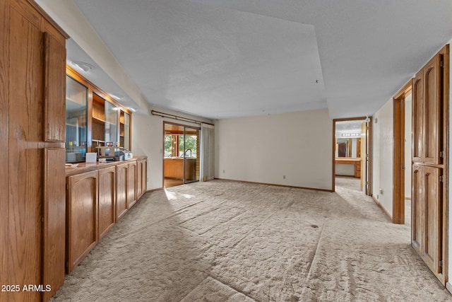 27610 W Gill Rd, Morristown, AZ 85342 - unfurnished living room with light colored carpet and baseboards