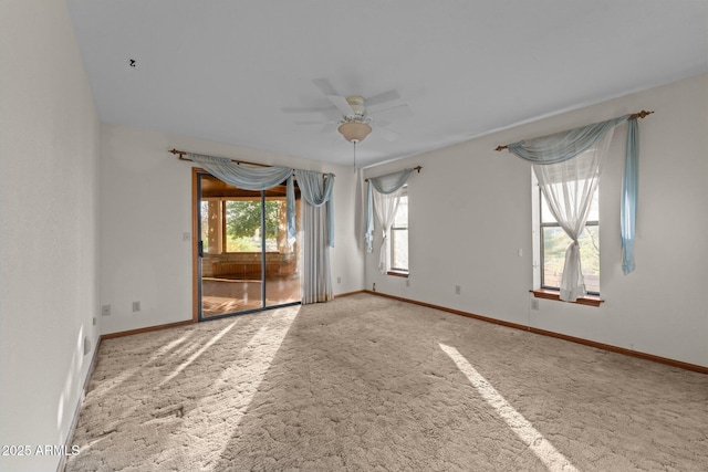 27610 W Gill Rd, Morristown, AZ 85342 - empty room with a ceiling fan, carpet floors, and baseboards