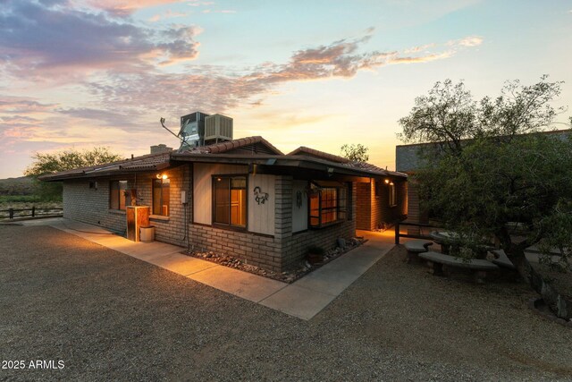 27610 W Gill Rd, Morristown, AZ 85342 - view of front of property featuring a chimney and central AC